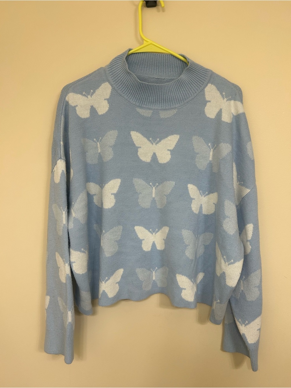 Blue butterfly mock neck sweater